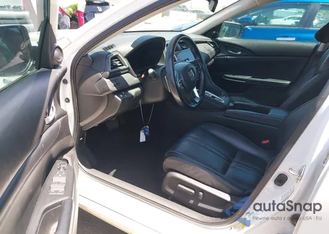 2020 Honda Insight Touring z USA, uszkodzony, nr VIN 19XZE4F9XLE003747